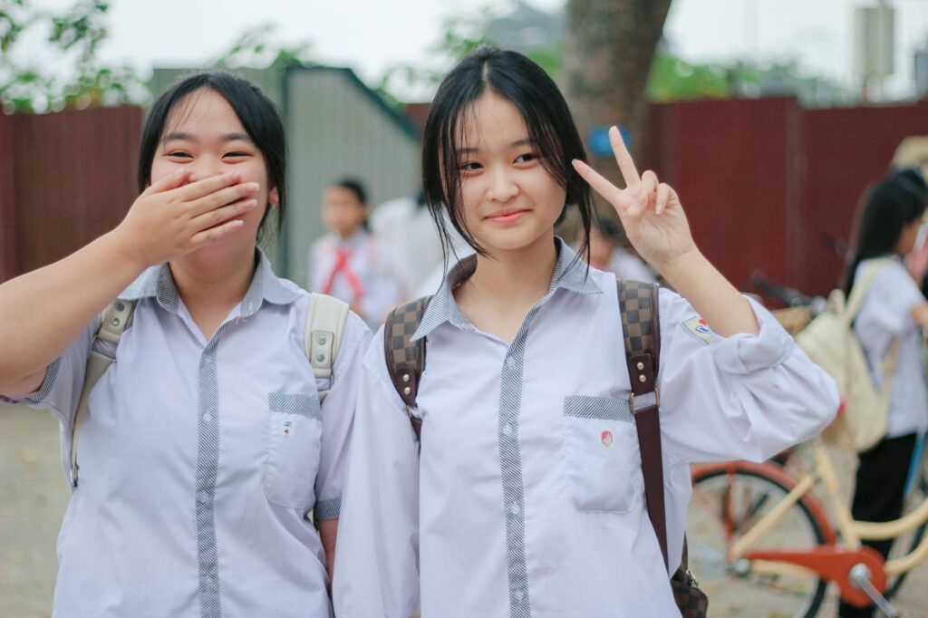 asian youth using smartphones